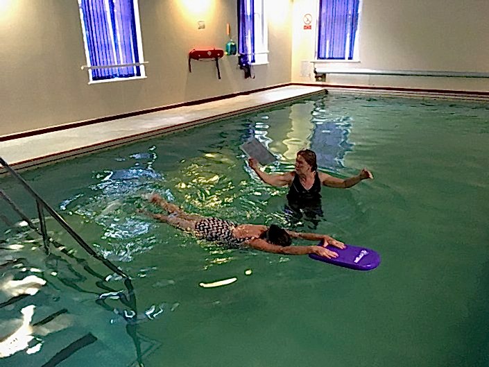 Bernadette performing Front Crawl leg kick....previously Bernadette was unable to put her face into the water and exhale